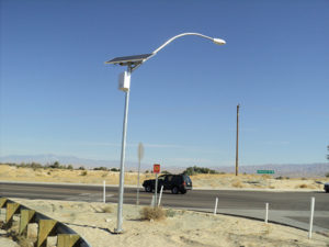 An aluminum pole used in a roadway solar lighting installation in Indio, CA