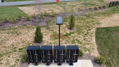 Aerial view of a solar led mailbox light installation with multiple mailboxes.